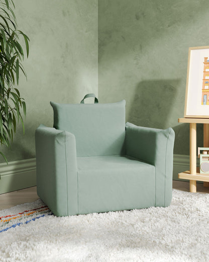 Le fauteuil Hug Mini en sergé