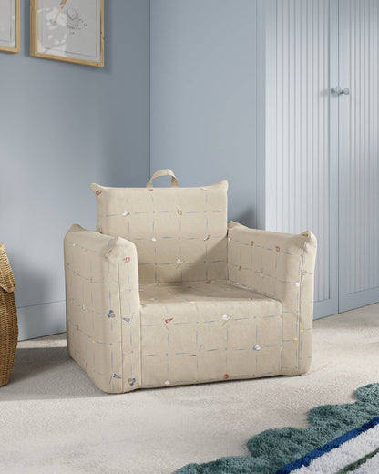 Le fauteuil Hug Mini en sergé