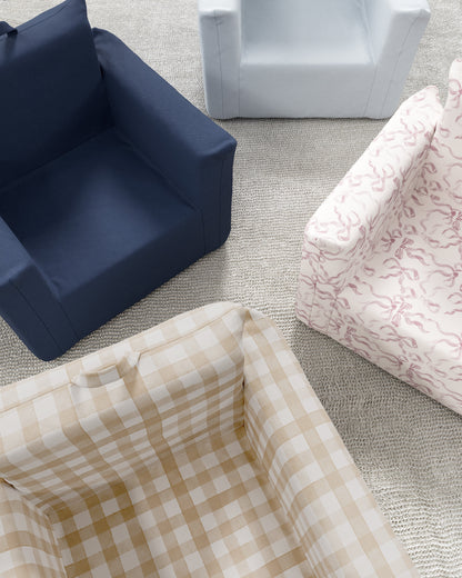 Le fauteuil Hug Mini en sergé