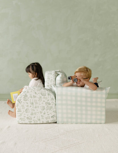 Le fauteuil Hug Mini en sergé