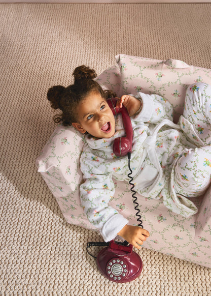 La mini-chaise Hug en treillis rose